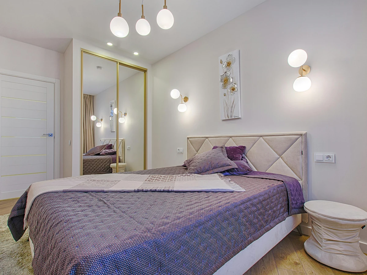 Bedroom painting with purple bedding in Darlington by Darlington Decorators