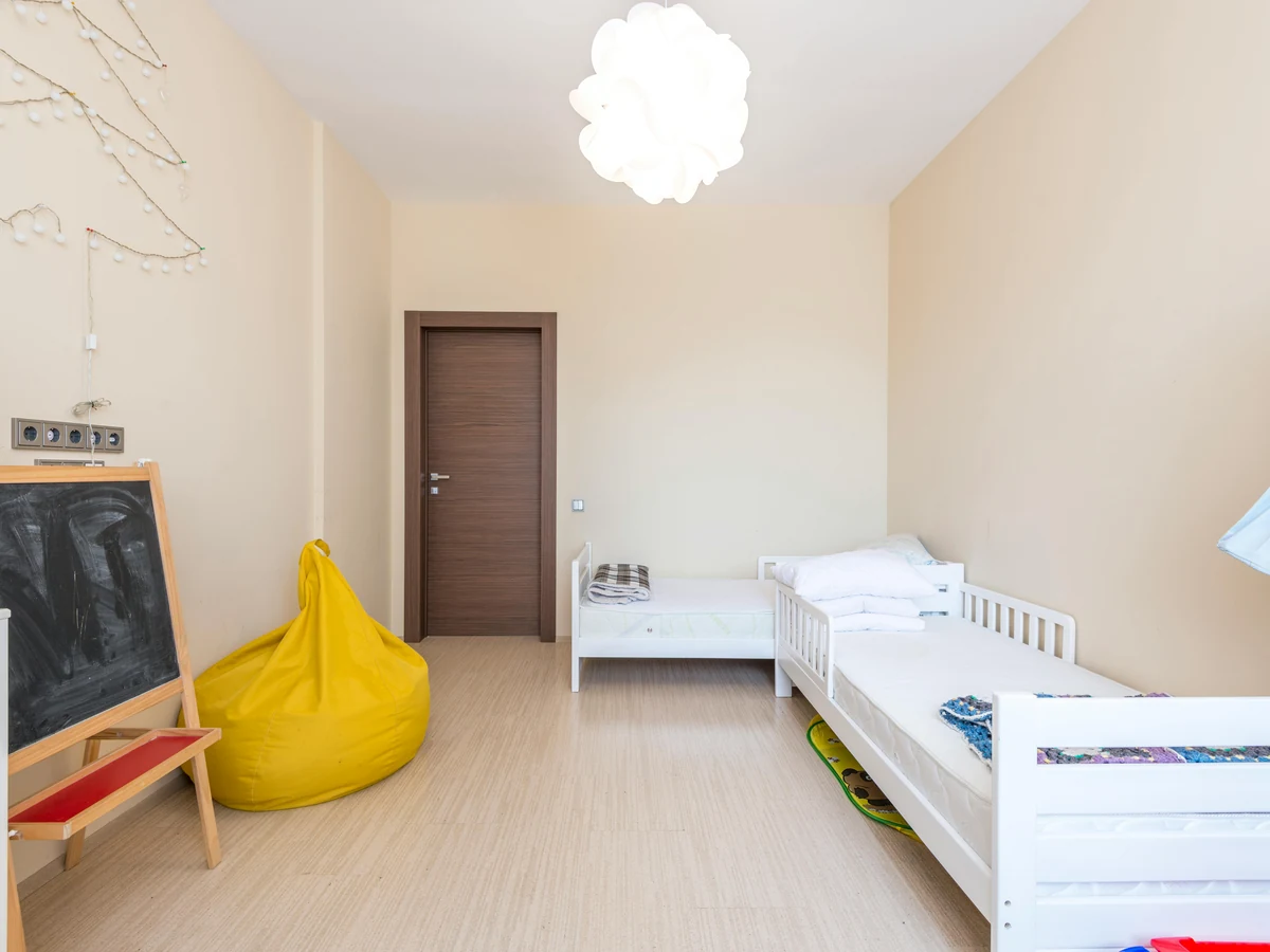 Children's bedroom painted in cream tones by Darlington Decorators