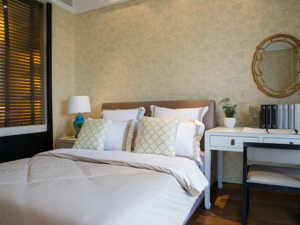 Warm textured bedroom wall finish by Darlington Decorators