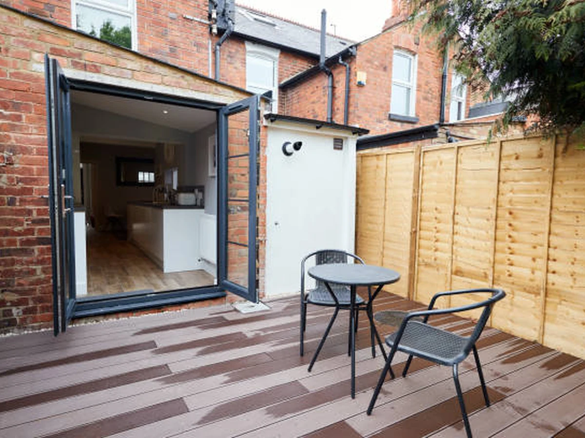 Urban terrace decking being painted in Darlington