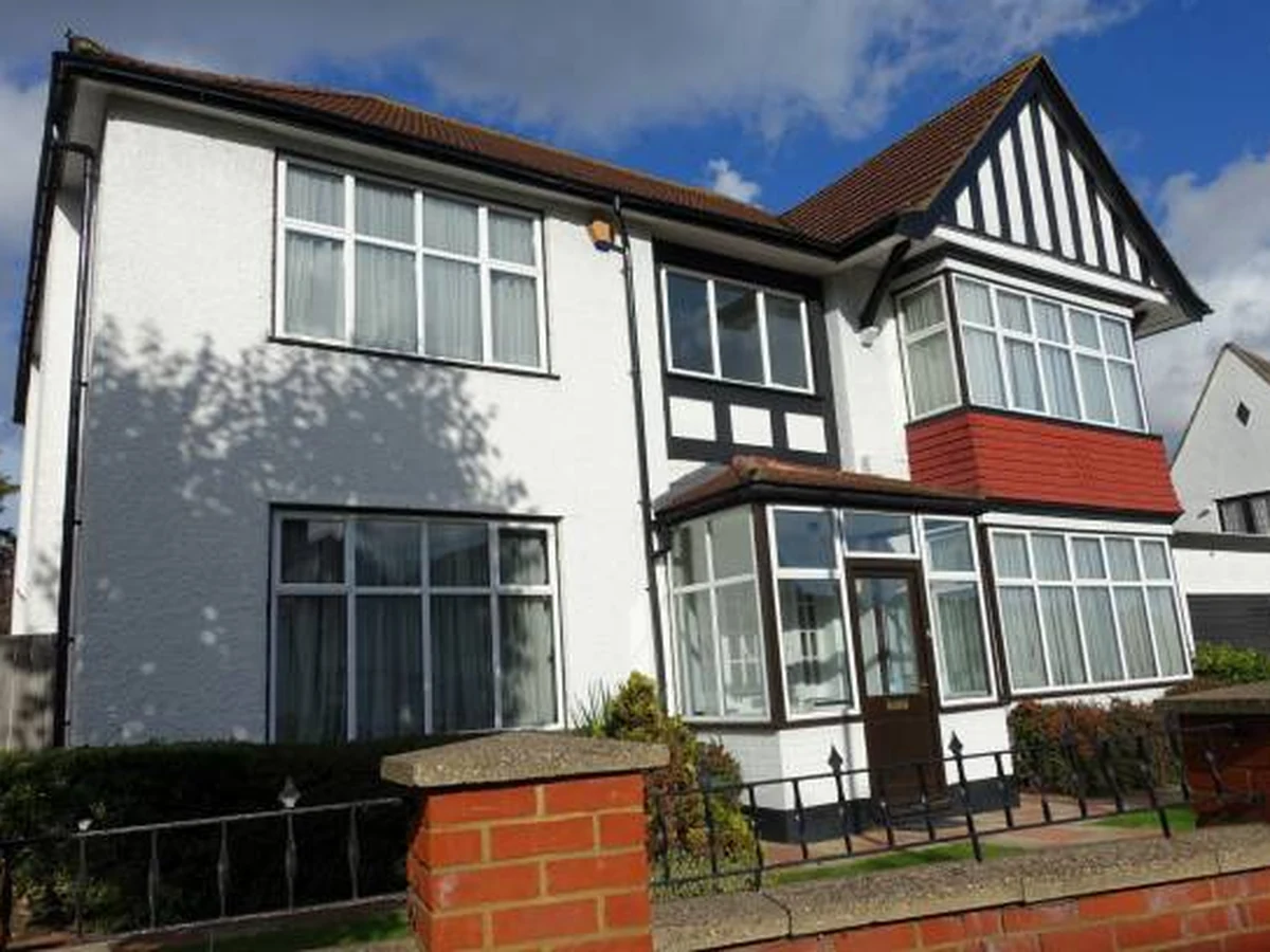 Exterior painting on a 1930s semi-detached house in Darlington by Darlington Decorators