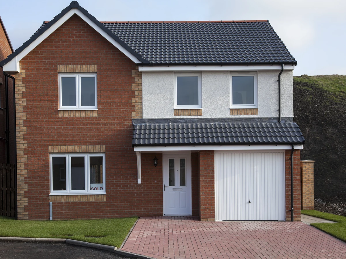 Exterior painting of a brick detached house in Catterick Village by Darlington Decorators