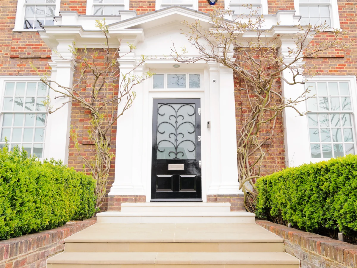 Exterior painting of a large red brick property in Harrowgate Hill by Darlington Decorators