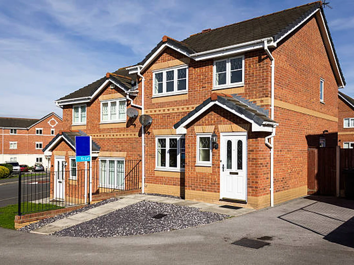 Red brick semi-detached exterior painting in Darlington