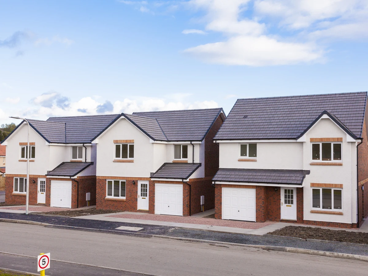 Exterior painting row of new detached houses by Darlington Decorators