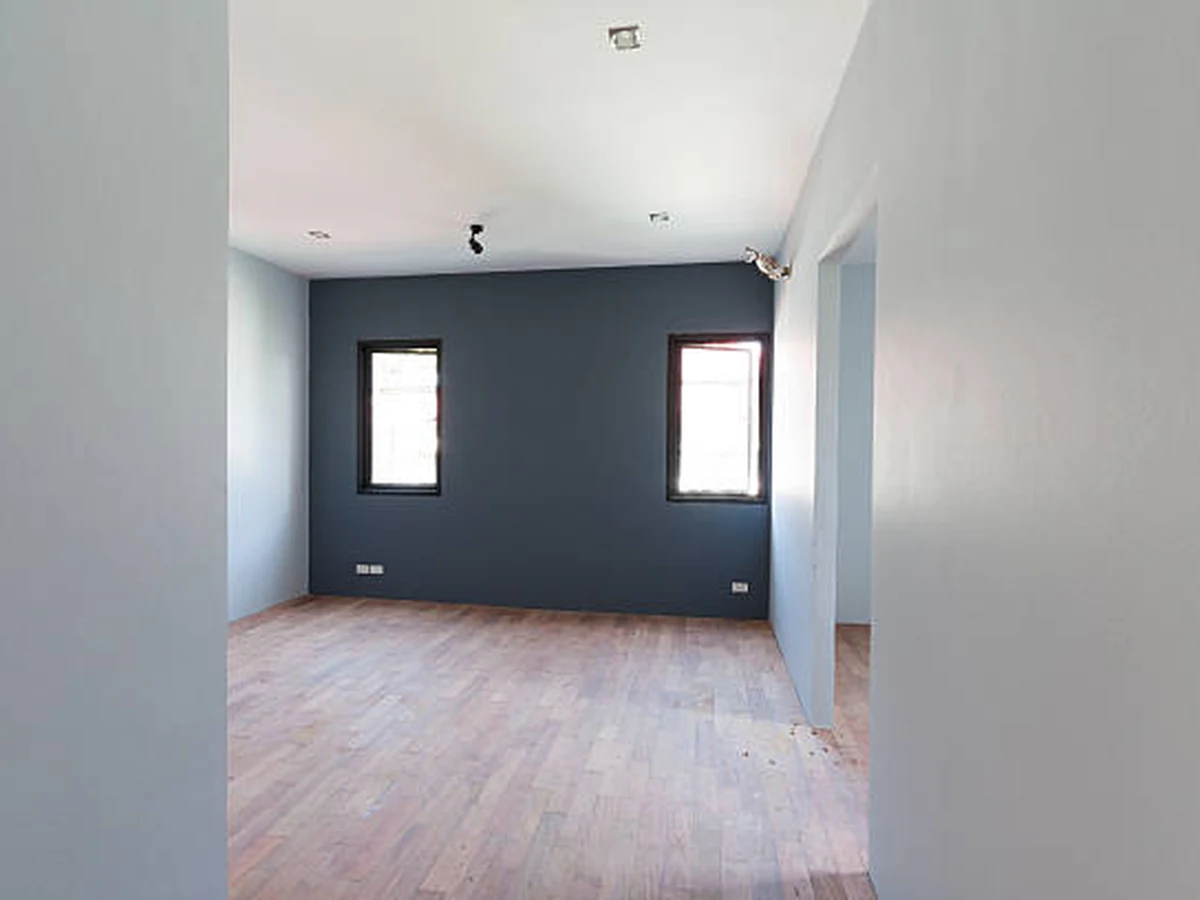 Dark painted interior room in Darlington, professional finish