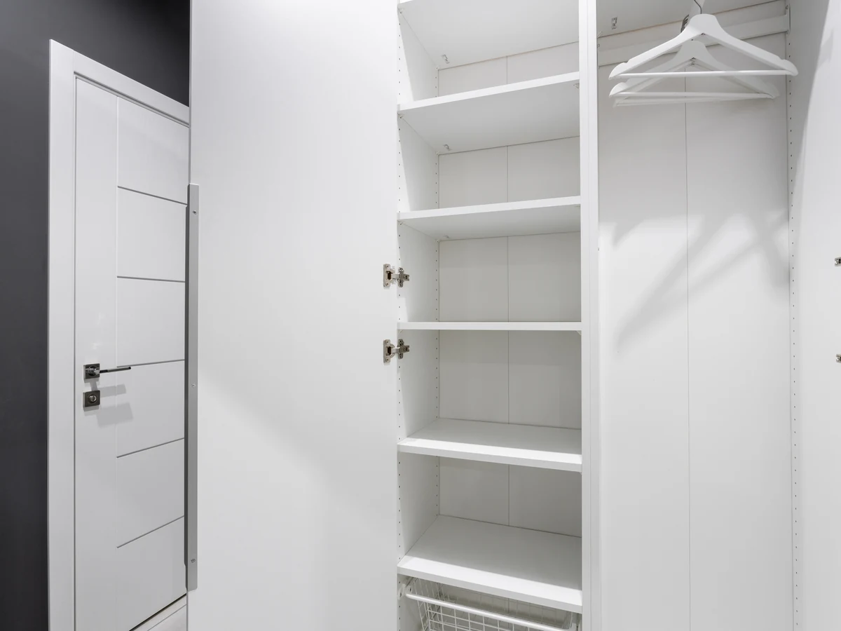 interior-painting-white-wardrobe-room-darlington-decorators White wardrobe room interior painting in Darlington
