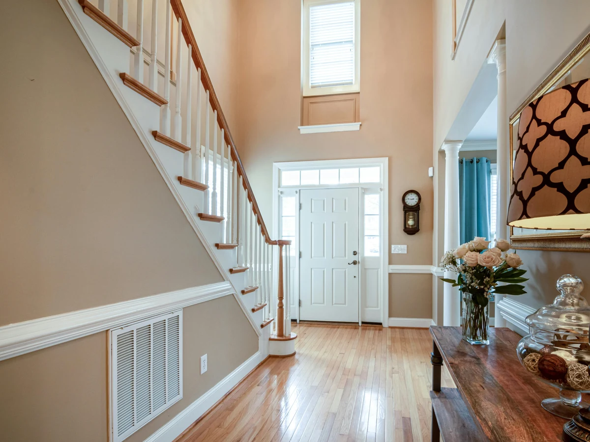 Two-tone staircase painting finish by Darlington Decorators
